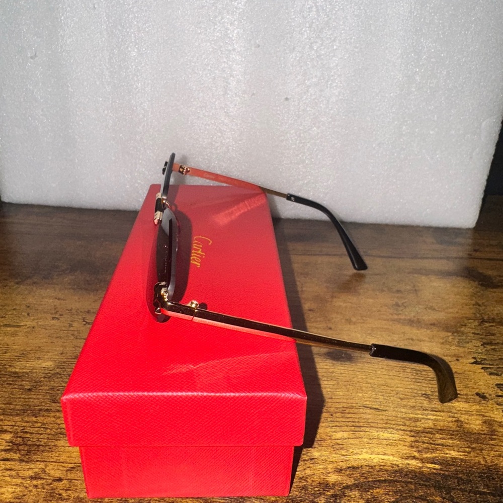 Cartier Gold Frame Sunglasses with Black Accents